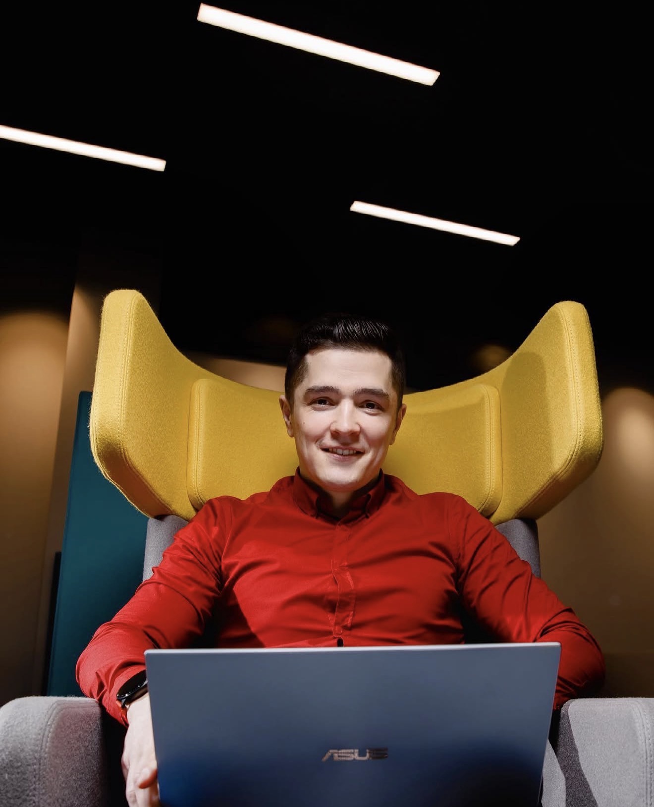Denis Sitnikov working with laptop
